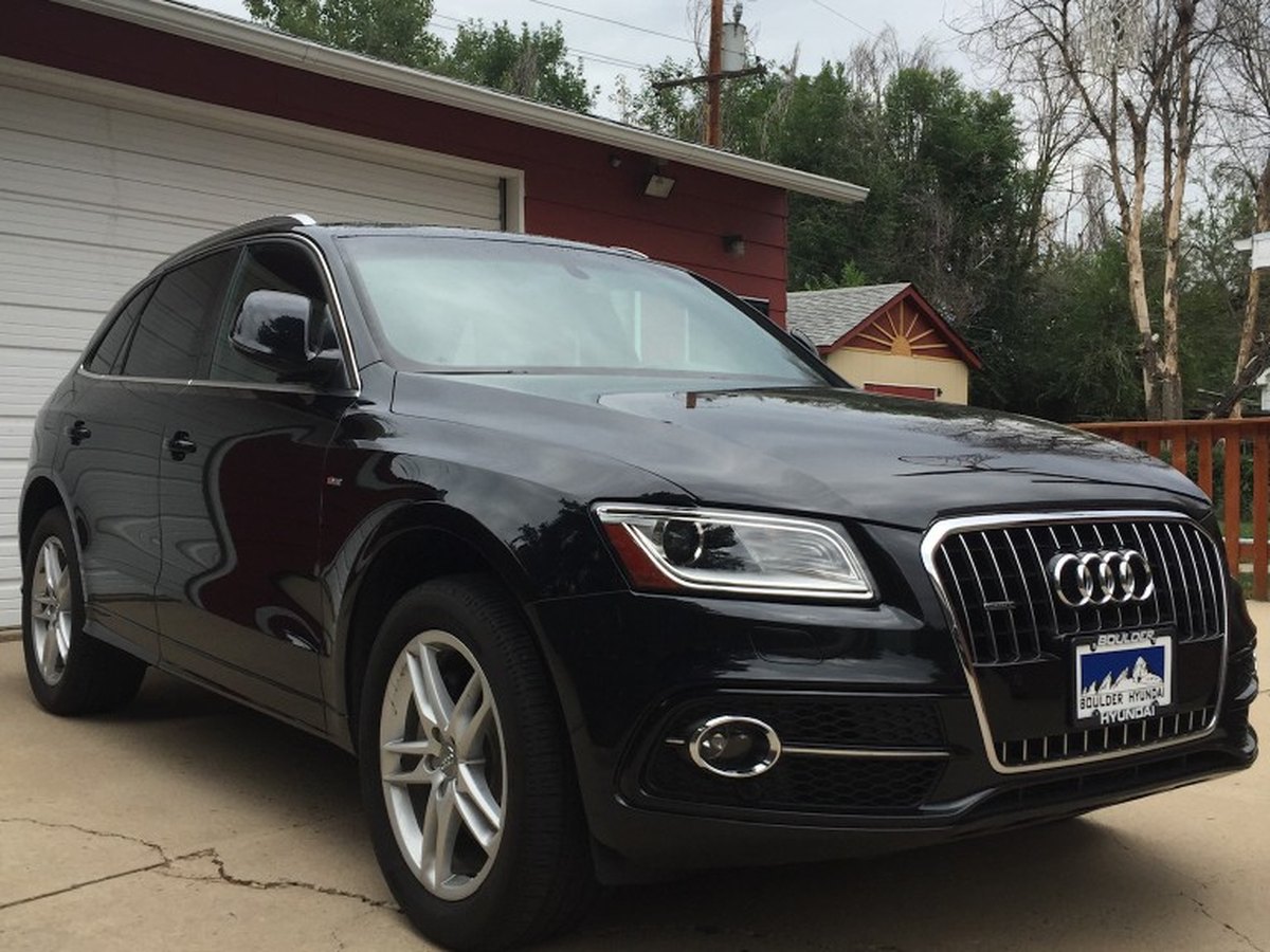 Black Audi Q5 front three-quarter after mobile detailing in North Denver